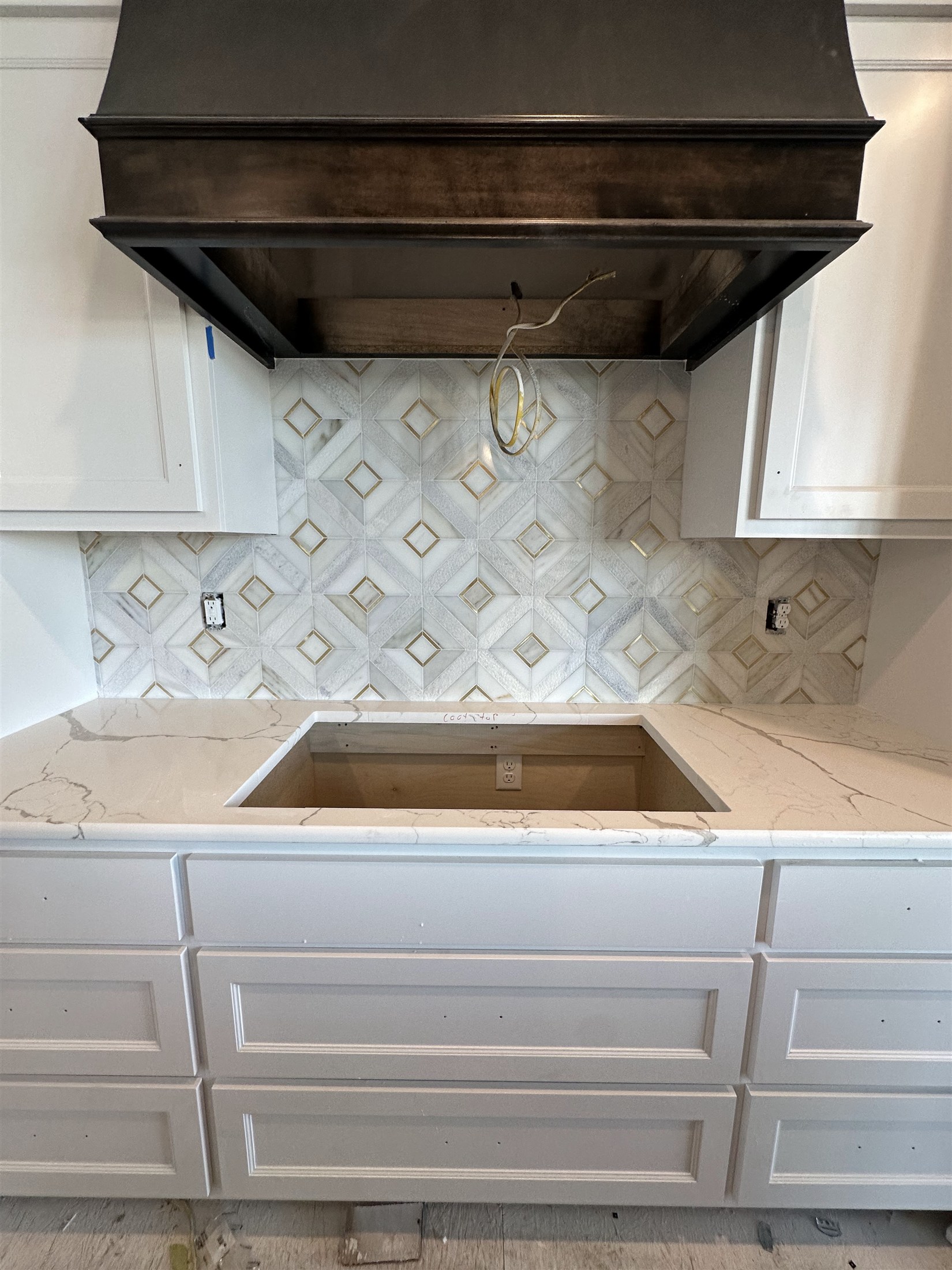 Patterned Heartland Tile kitchen backsplash